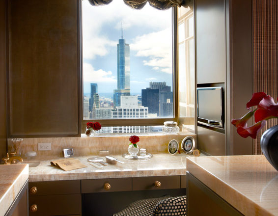 penthouse dressing room detail of her makeup table and view of Chicago skyline
