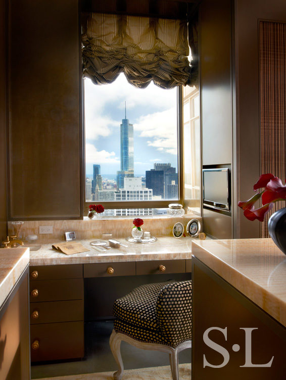 penthouse dressing room detail of her makeup table and view of Chicago skyline