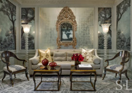 St. Regis NY owner’s suite living room with ornate silver-leaf mirror and English klismos chairs
