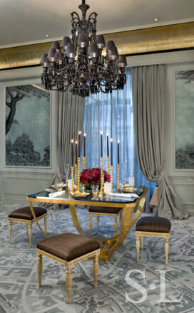 St. Regis NY owner’s suite dining table with black glass top and black Baccarat chandelier