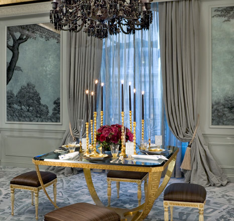 St. Regis NY owner’s suite dining table with black glass top and black Baccarat chandelier
