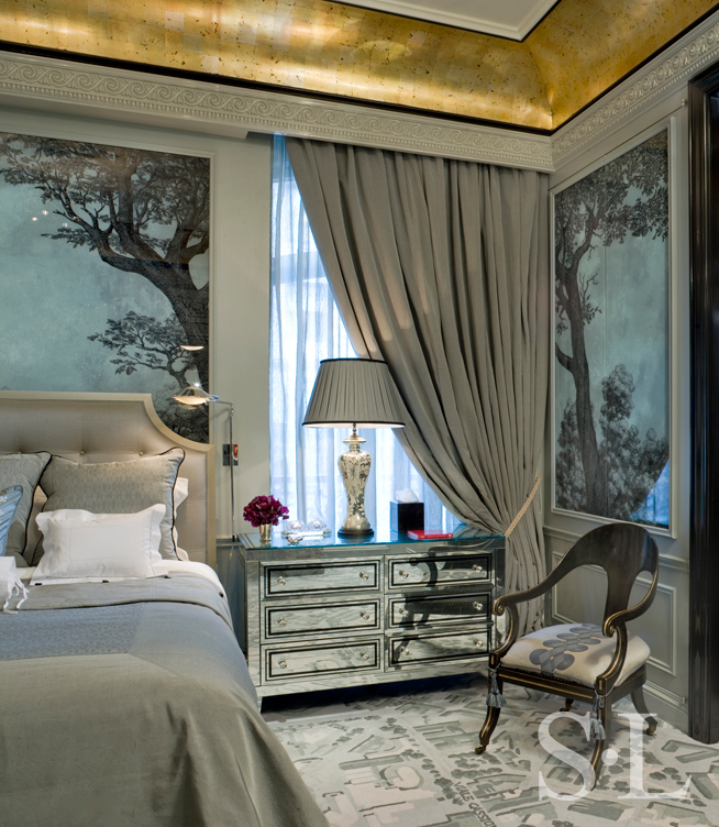 St. Regis NY owner’s suite bedroom detail with mirrored bedside tables, and mercury-glass lamps