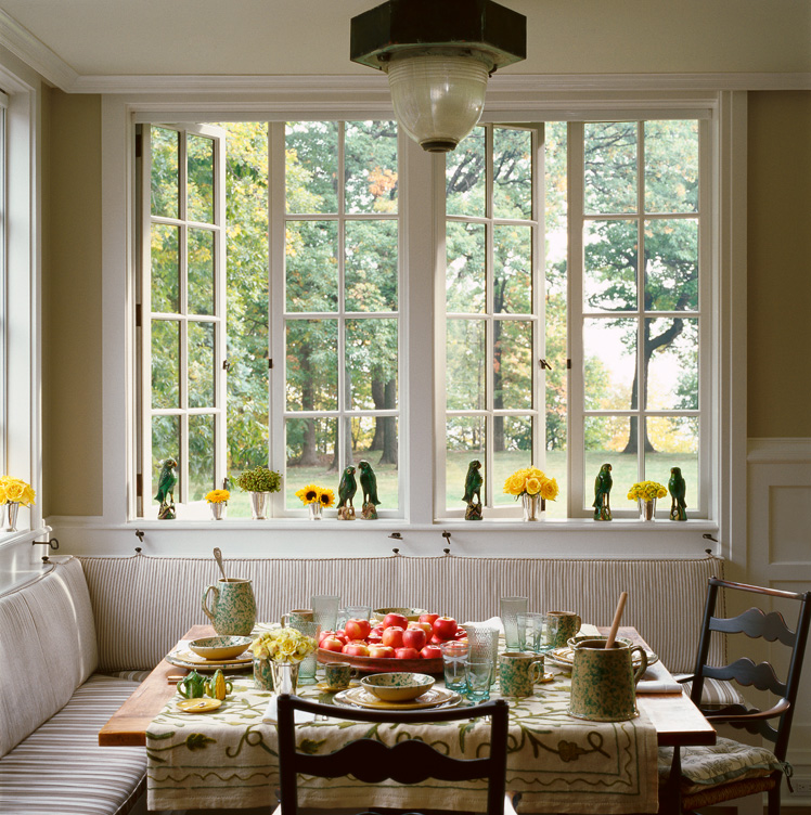 Restored landmark residence on former military base sun porch breakfast room with Lake Michigan view
