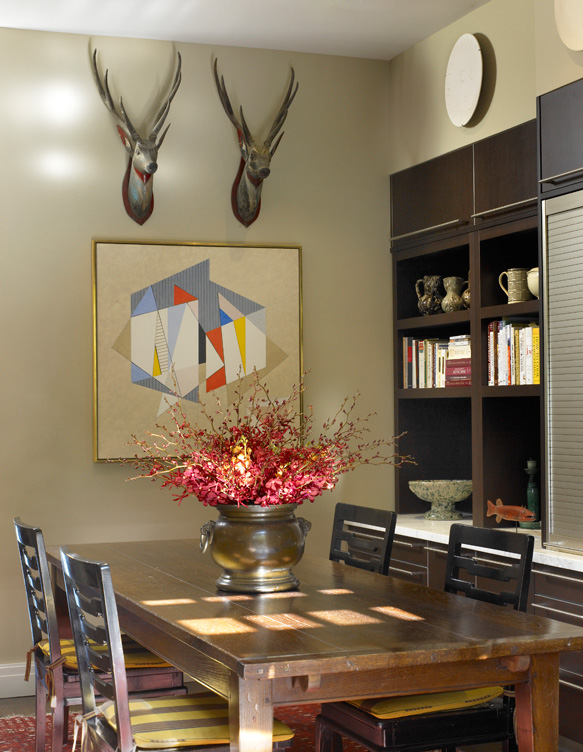 Chicago townhome dining area with artwork by Herbert Bayer