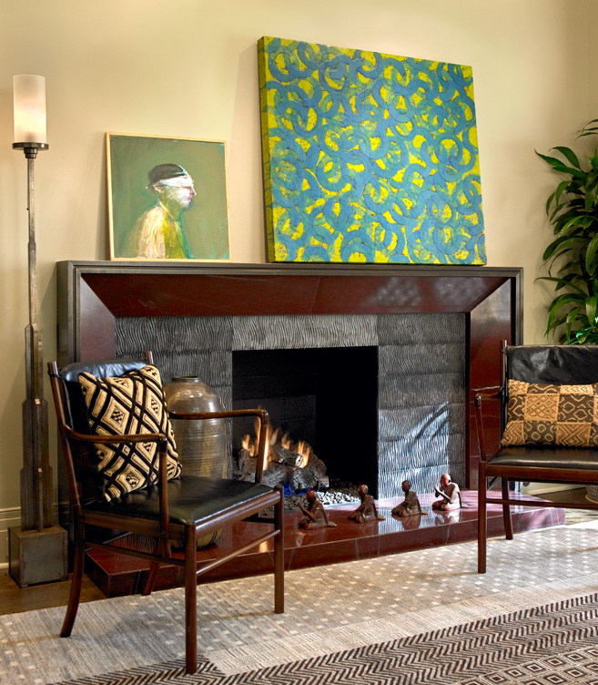 Chicago high-rise apartment living room detail showing fireplace and artwork by Joby Baker and Bill Zima