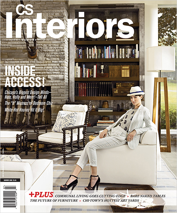 Magazine Cover showing model in great room of lake house designed by Suzanne Lovell