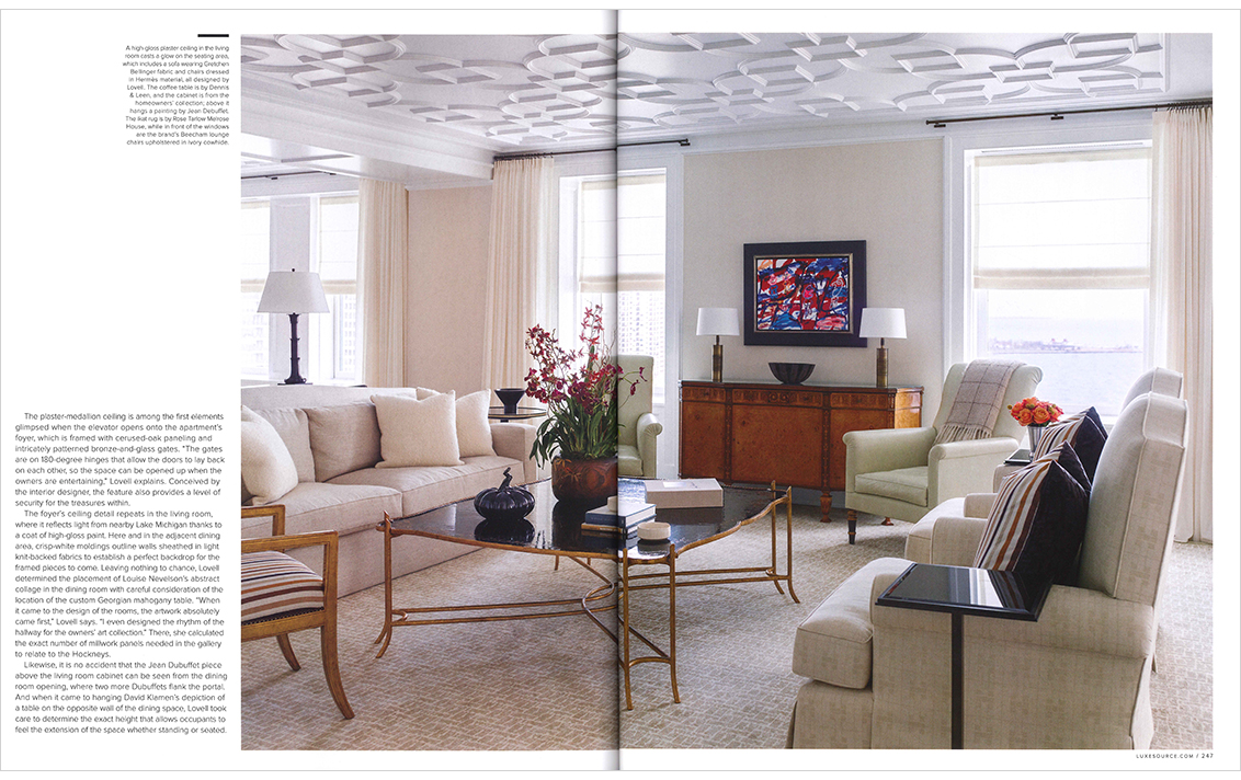 Luxe Chicago magazine spread showcasing living room designed in neutral palette with high-gloss plaster ceiling and views of Lake Michigan
