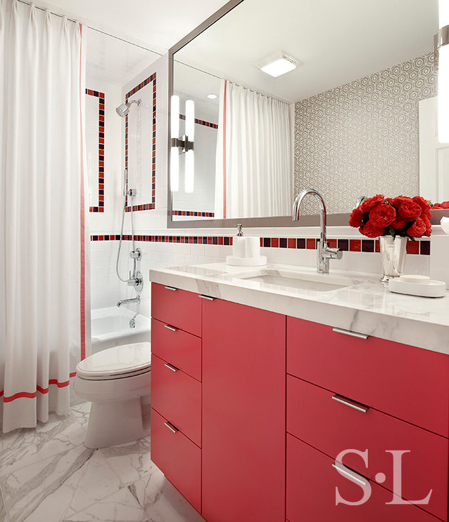 Girl's bathroom designed in whites and deep pink