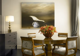 Dining room in waterfront townhome featuring a set of circa 1820 Biedermeier dining chairs and a painting by artist David Kroll