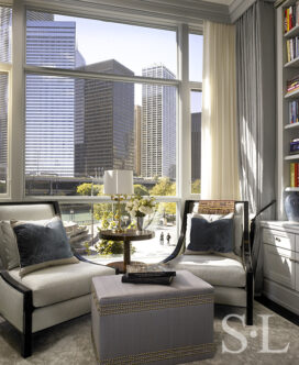 The Master Bedroom Sitting Room on the Second Floor of this waterfront townhome overlooks a river walk and esplanade park in Chicago