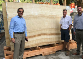 Architect and builders selecting stone slabs for residence in Florida designed by Suzanne Lovell Inc.