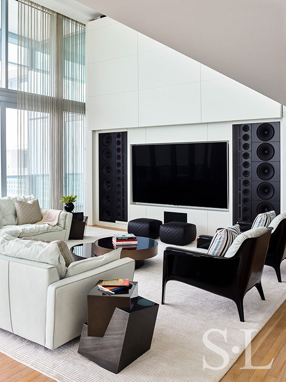 Sound and AV system featuring Steinway speaker system in contemporary great room