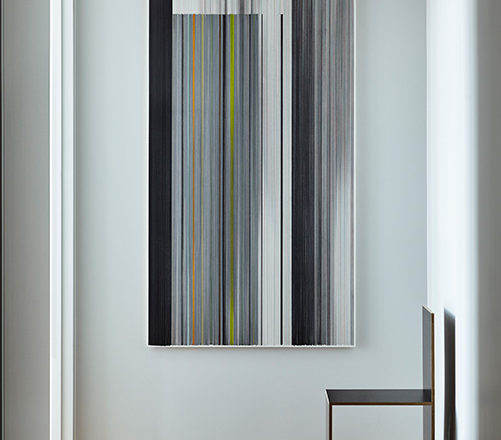 Hallway detail with artwork by Anne Lindberg and plywood chair by Donald Judd