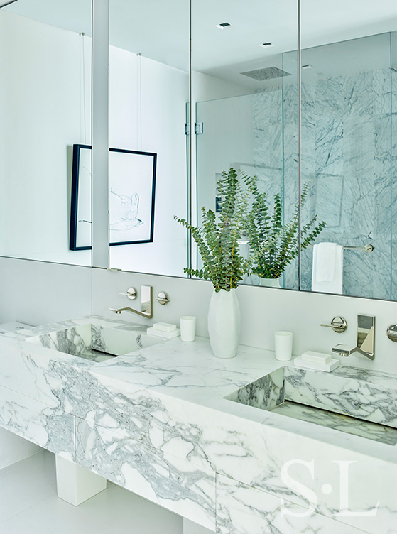 Contemporary master bathroom in white and grey in Miami Beach penthouse designed by Suzanne Lovell Inc.