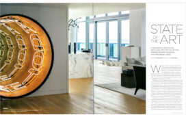 Luxe Magazine spread showing entry and view into living room of Miami Beach penthouse with large scale artwork by Iván Navarro