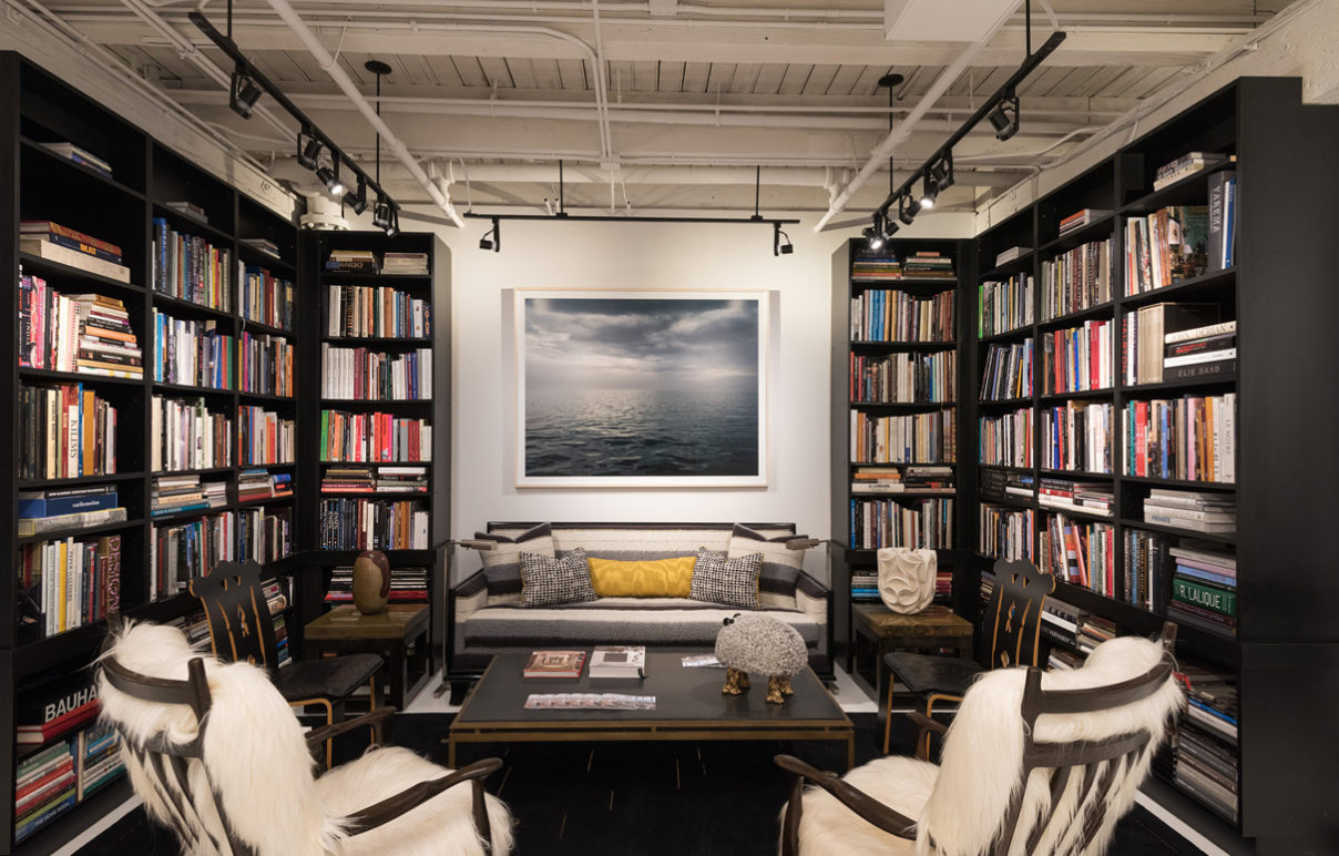The black and white living room and library of Suzanne Lovell Inc.'s Chicago interior design studio