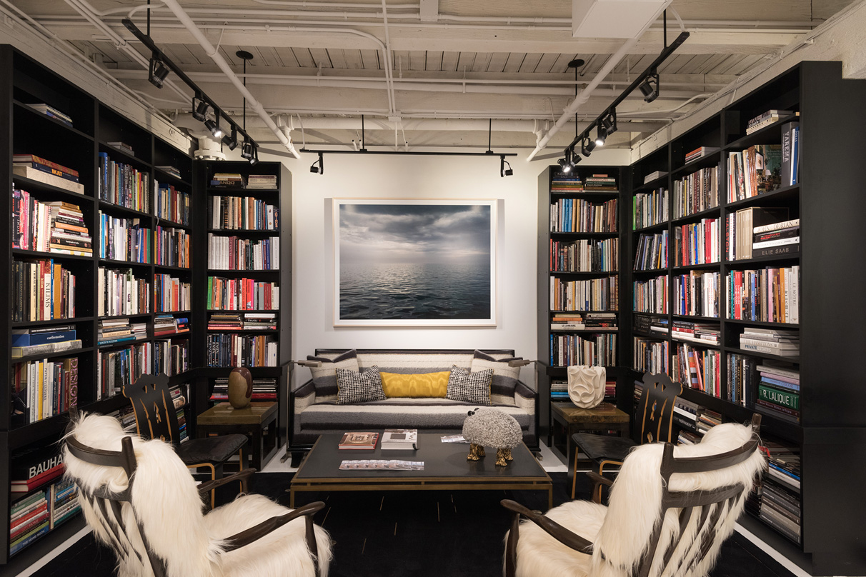 The black and white living room and library of Suzanne Lovell Inc.'s Chicago interior design studio