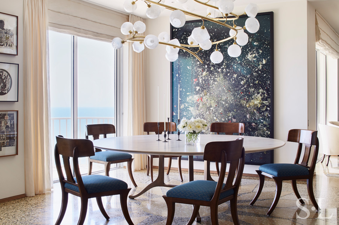 Gulf Coast Penthouse dining room featuring artwork by Ori Gersht architecture and interior design by Suzanne Lovell Inc.
