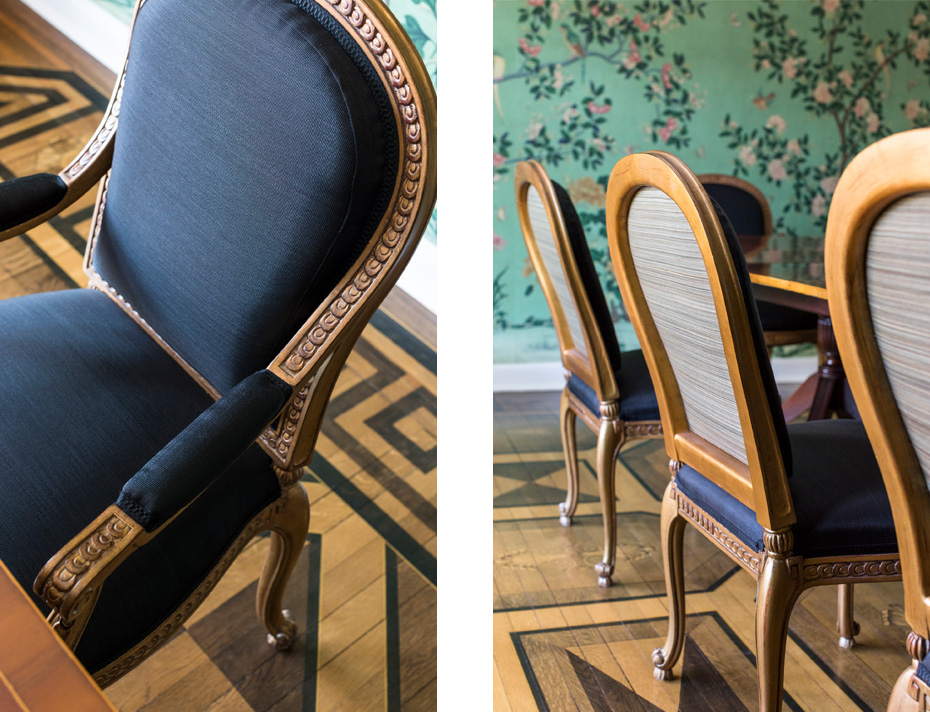 Dining chairs upholstered in black and striped horsehair