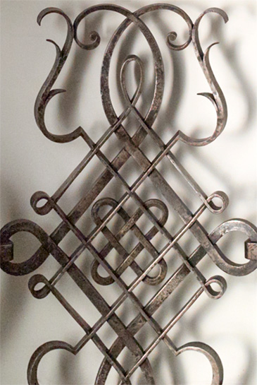 Detail of wrought iron base of console by Gilbert Poillerat