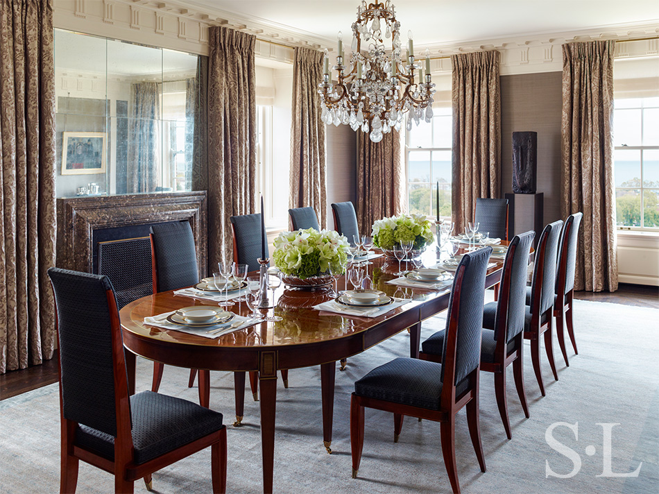 Dining room luxury interior renovation featuring silk wall upholstery by Jim Thompson and Fortuny drapery