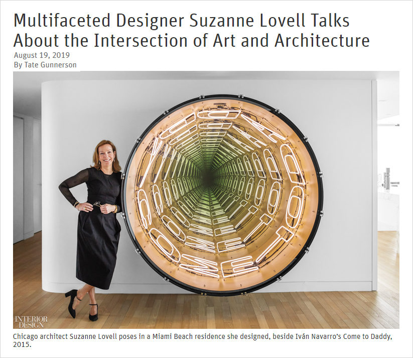 Portrait of Suzanne Lovell with artwork by Iván Navarro in Miami Beach penthouse she designed