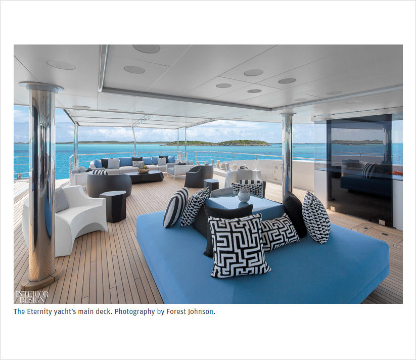 Main deck of Eternity yacht with black, white and blue furnishings designed by Suzanne Lovell