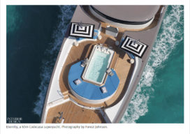 View of Eternity yacht from above with hot tub and black and white striped sun umbrellas