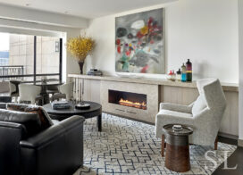 Chicago luxury high-rise apartment living room in warm, neutral tones