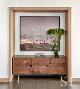 Chicago luxury apartment residence niche detail with credenza and artwork by Ori Gersht