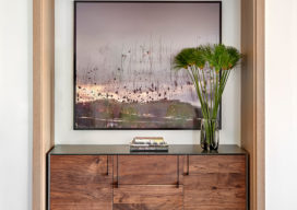 Chicago luxury apartment residence niche detail with credenza and artwork by Ori Gersht