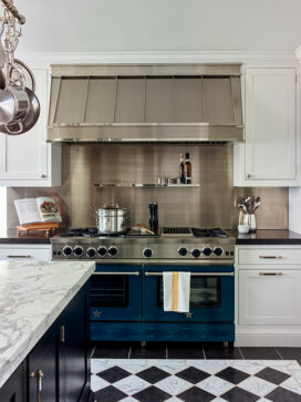 Scarsdale, NY kitchen renovation with a Bluestar platinum range with stainless steel backguard and hood