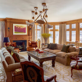 Scarsdale, NY residence family room renovation with original leaded windows and fireplace