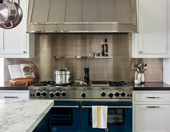 Scarsdale, NY kitchen renovation with a Bluestar platinum range with stainless steel backguard and hood