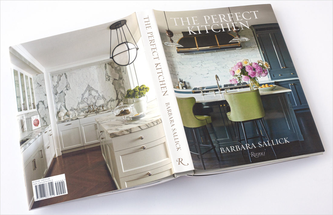 Photo of dust cover of book, with kitchen by interior designer Suzanne Lovell on the back cover