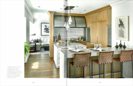 Book spread featuring a kitchen designed by Suzanne Lovell in a Chicago residence in neutral tones with a casual feel