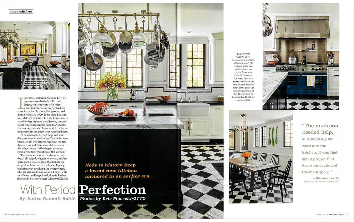 Kitchen renovation in historic home featuring original leaded windows and black-and-white checkerboard marble floor, center island and hanging pot rack