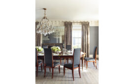 Dining room in Lakeview Residence designed by Suzanne Lovell featuring Fortuny drapery