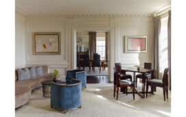 Living room view towards dining room in Lakeview Residence designed by Suzanne Lovell