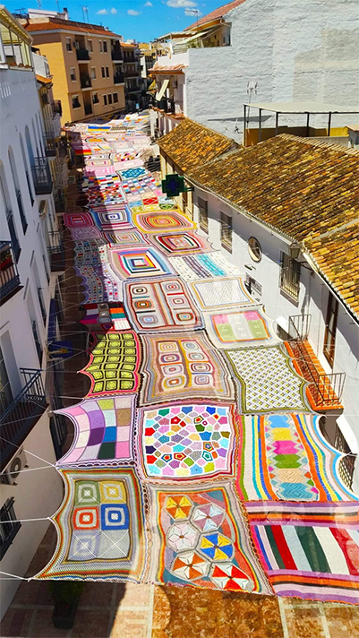 Spanish Artists Decorate The Shopping District In Malaga With A Colorful Crocheted Canopy.