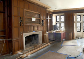 Before photo of library showing existing English oak paneling