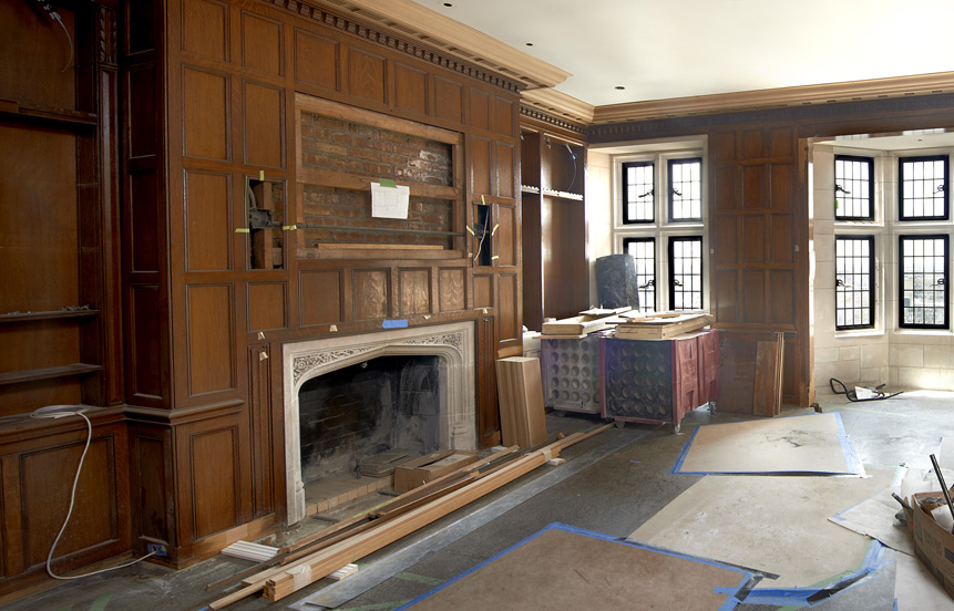 Before photo of library showing existing English oak paneling