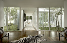 View from front door through atrium hallway into great room