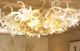 Large custom chandelier by Dale Chihuly inspired by painting of octopus