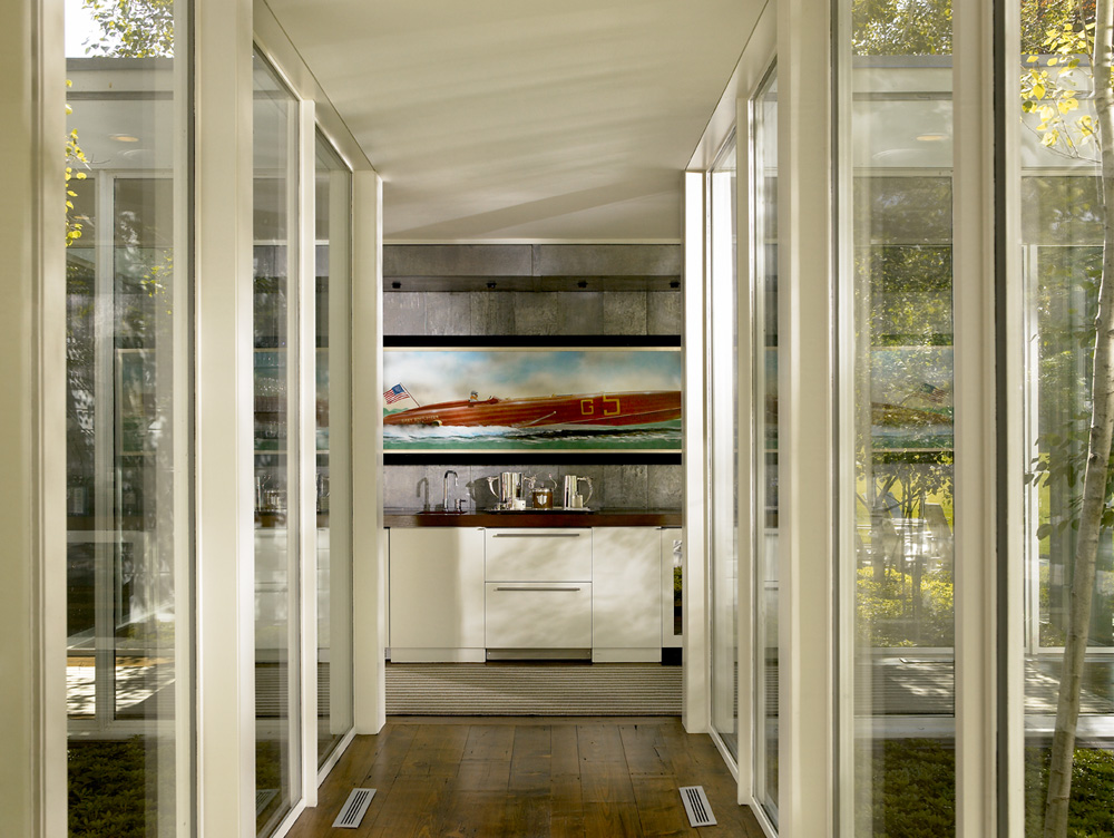 Hallway view towards wet bar with zinc covered walls