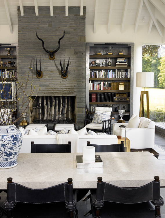 Great room detail view of fireplace over dining table