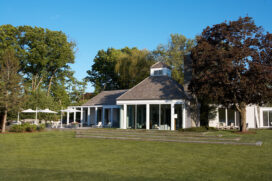 Exterior view of back of home showing swimming pool