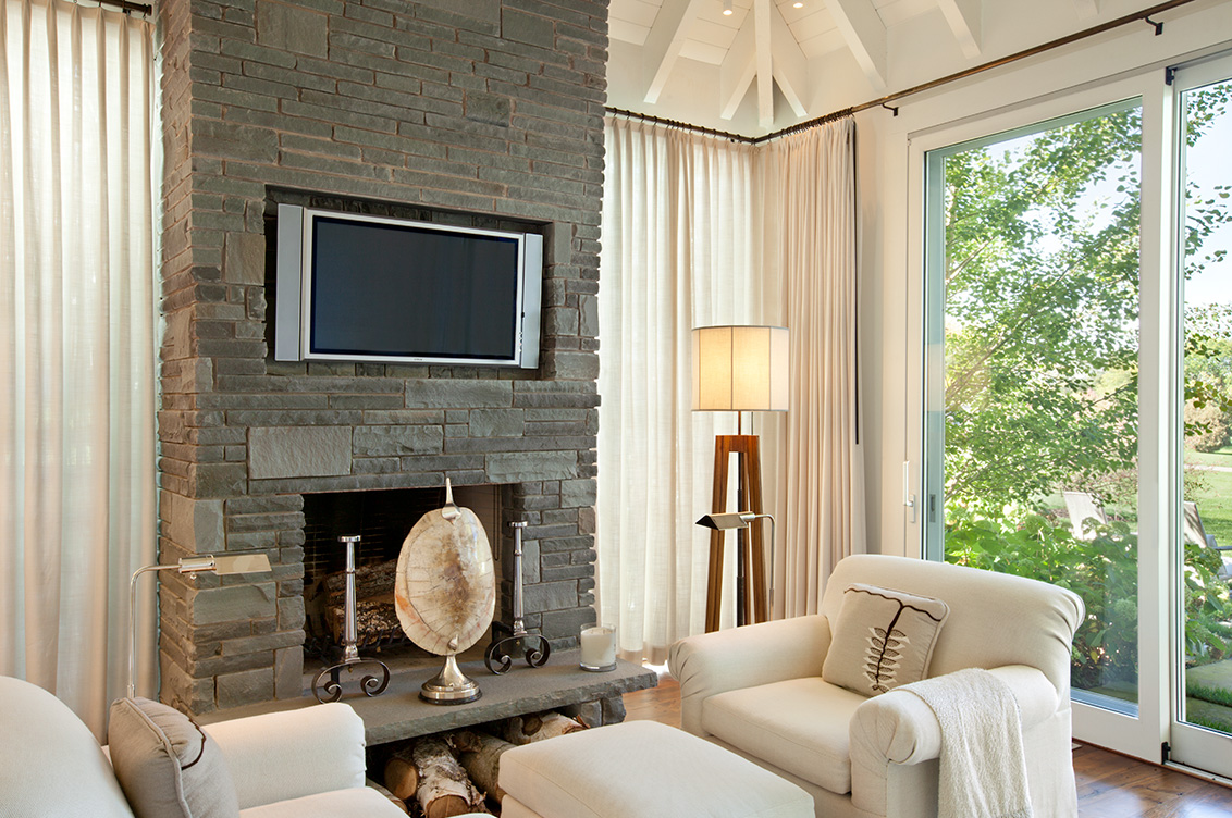Master bedroom view of fireplace and seating area