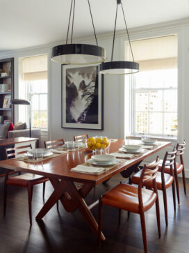 Breakfast room featuring an original table by Le Corbusier and Pierre Jeanneret and mid-century modern chairs