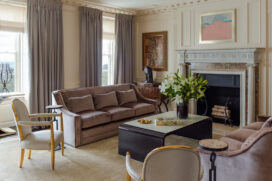 Living room luxury interior renovation featuring the fully restored original fireplace